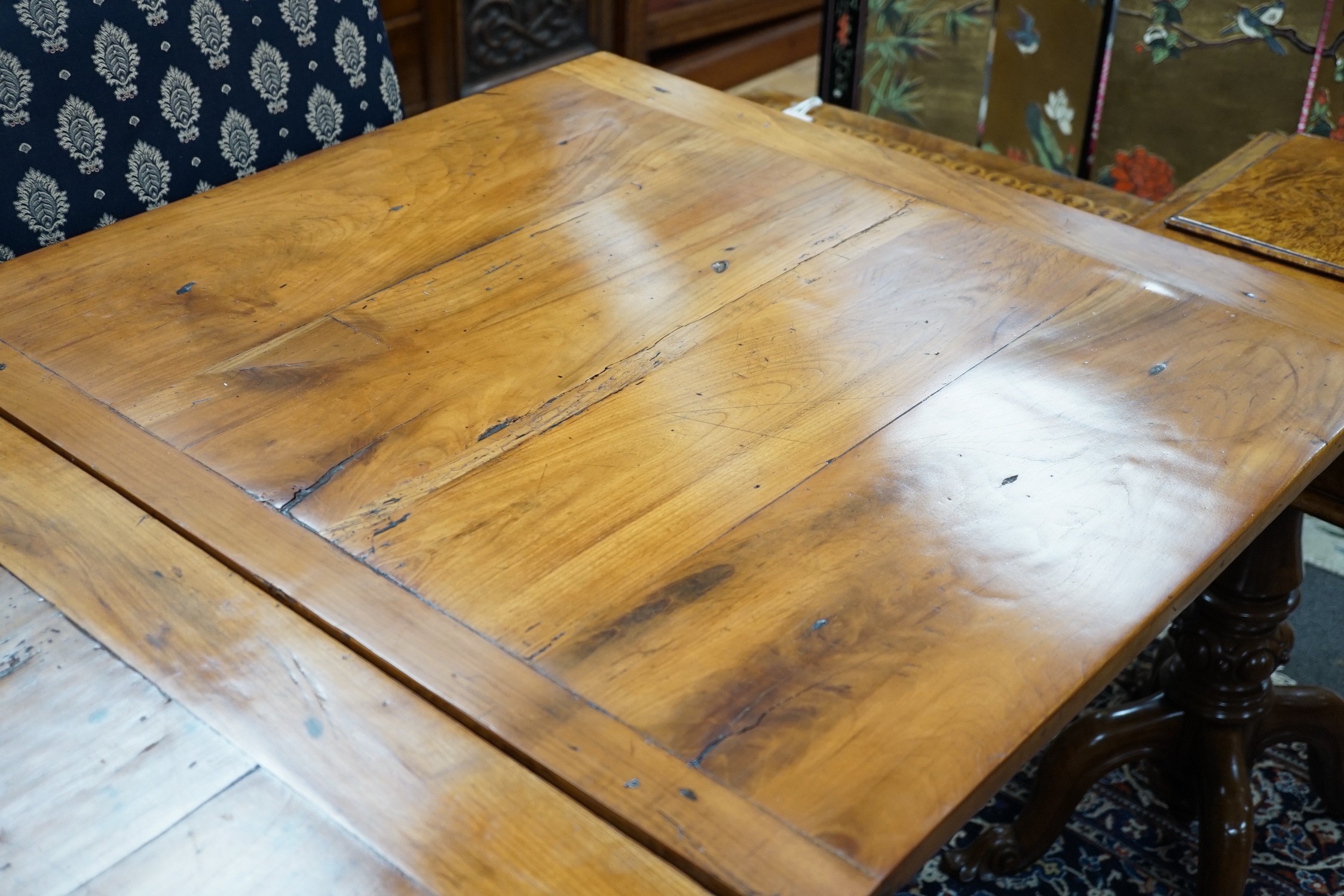 A late 19th century French fruitwood draw leaf table, 166 x 81cm, extends to 317cm, height 78cm *Please note the sale commences at 9am.